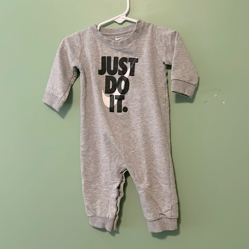 Practically brand new- Nike onesie 6m